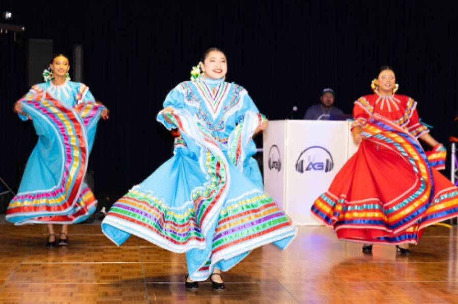 dancers in traditional ballet folklorico dresses